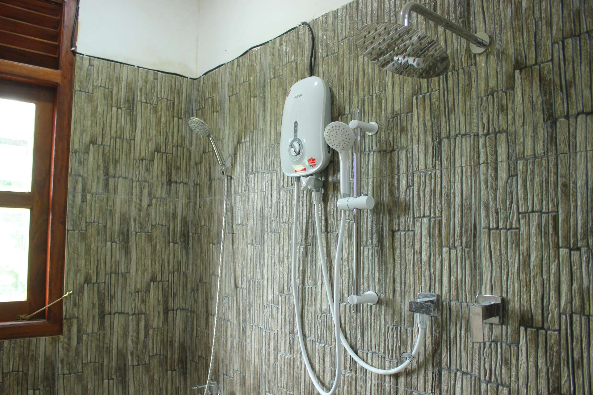 Bathroom rain shower at Heritage Eco Resort Kelaniya